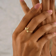 Model is wearing a olive leaf ring. Ring material: 14k gold filled.